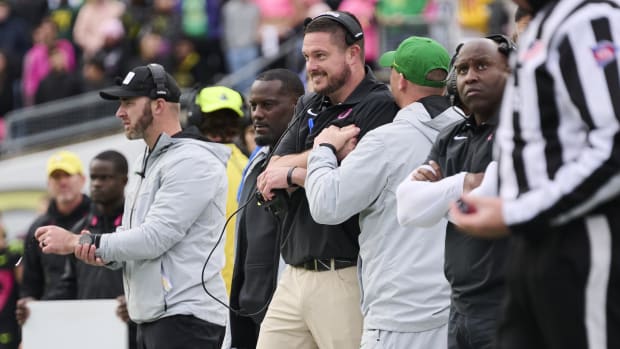 Oregon Ducks head coach Dan Lanning celebrates on the sidelines during the second half against the UCLA Bruins.