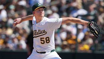 Apr 9, 2025; West Sacramento, California, USA; Athletics pitcher Noah Murdock (58) throws a pitch against the San Diego Padres during the seventh inning at Sutter Health Park. Mandatory Credit: Darren Yamashita-Imagn Images