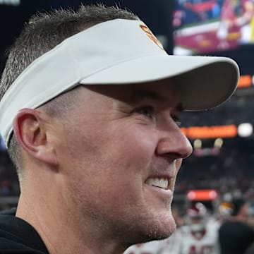 Dec 27, 2024; Las Vegas, NV, USA; Southern California Trojans head coach Lincoln Riley reacts after the game against the Texas A&M Aggies at Allegiant Stadium. Mandatory Credit: Kirby Lee-Imagn Images