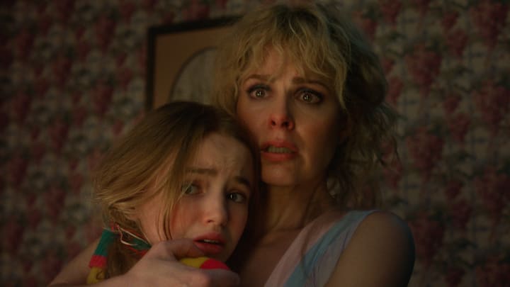 STRANGER THINGS. (L to R) Nell Fisher as Holly Wheeler and Cara Buono as Karen Wheeler in STRANGER THINGS. Cr. Courtesy of Netflix © 2025