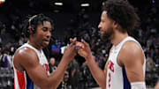 Dec 26, 2024; Sacramento, California, USA; Detroit Pistons guard Jaden Ivey (23) and guard Cade Cunningham (2) celebrate after the win against the Sacramento Kings at Golden 1 Center. Mandatory Credit: Kelley L Cox-Imagn Images