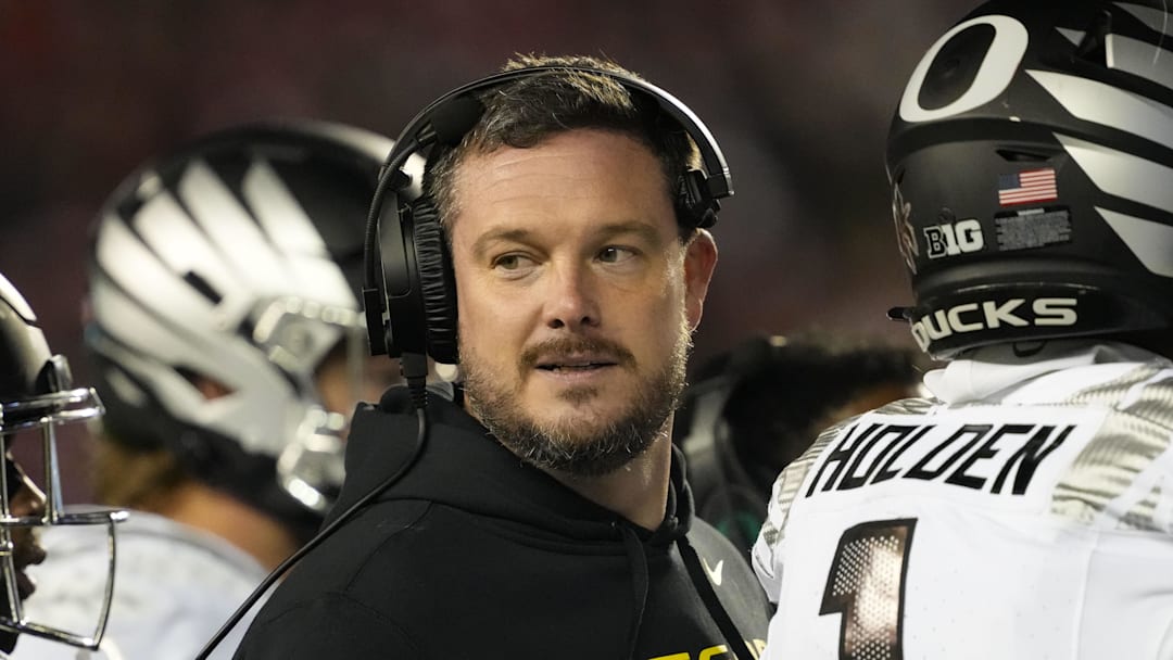 Nov 16, 2024; Madison, Wisconsin, USA;  Oregon Ducks head coach Dan Lanning looks on during the third quarter against the Wisconsin Badgers at Camp Randall Stadium. 