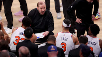 New York Knicks coach Tom Thibodeau talks to Karl-Anthony Towns, Josh Hart and OG Anunoby during the 2025 NBA Playoffs