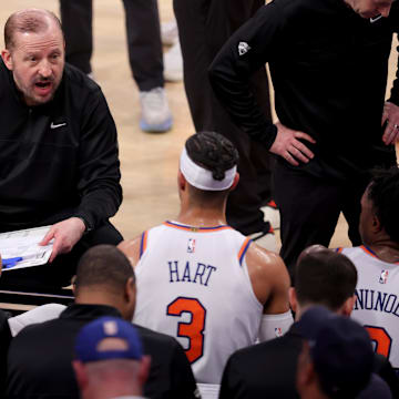 New York Knicks head coach Tom Thibodeau talks to center Karl-Anthony Towns (32) and guard Josh Hart (3) and forward OG Anunoby (8) during a time out during the third quarter of game six in the second round of the 2025 NBA Playoffs against the Boston Celtics at Madison Square Garden. Mandatory Credit: Brad Penner-Imagn Images