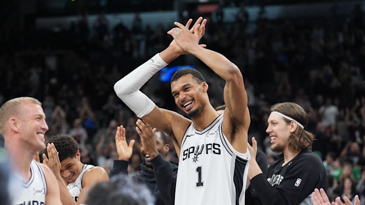 Mar 10, 2026; San Antonio, Texas, USA; San Antonio Spurs forwards Victor Wembanyama (1) and Mason Plumlee (45) celebrate after defeating the Boston Celtics at Frost Bank Center. Mandatory Credit: Daniel Dunn-Imagn Images