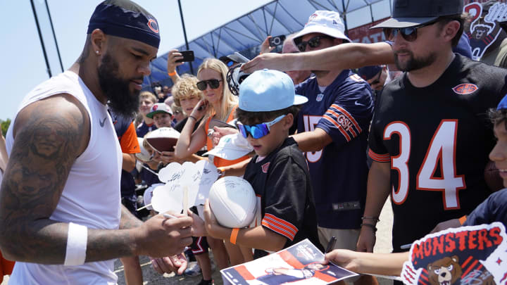 Keenan Allen signs autographs at Bears camp. Allen named a teammate who should have been on the top 100 list.