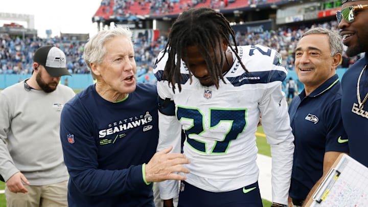 Pete Carroll and Riq Woolen of the Seattle Seahawks