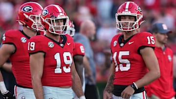 Georgia Bulldogs tight end Brock Bowers (19) and quarterback Carson Beck (15)