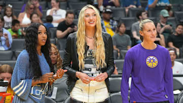 LA Sparks players Lexie Brown, Cameron Brink and Stephanie Talbot watch during the game against the Minnesota Lynx