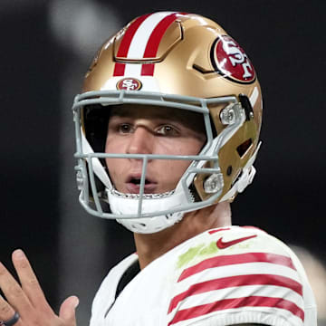 Aug 23, 2024; Paradise, Nevada, USA; San Francisco 49ers quarterback Brock Purdy (13) throws the ball against the Las Vegas Raiders in the first half at Allegiant Stadium. Mandatory Credit: Kirby Lee-Imagn Images