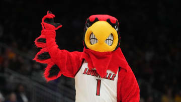 Mar 24, 2023; Seattle, WA, USA; Louisville Cardinals mascot Louie gestures against the Ole Miss Rebels in the first half at Climate Pledge Arena.