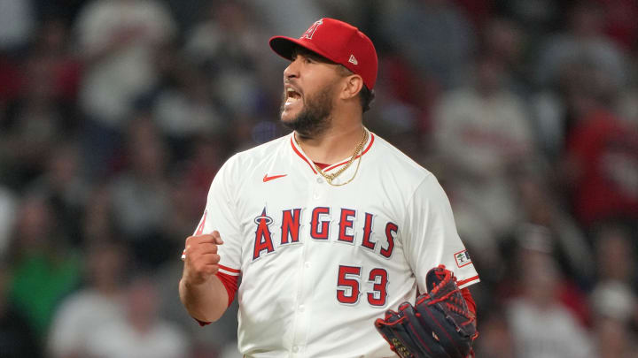 Jun 17, 2024; Anaheim, California, USA; Los Angeles Angels relief pitcher Carlos Estevez (53) celebrates at the end of the game against the Milwaukee Brewers at Angel Stadium. Mandatory Credit: Kirby Lee-USA TODAY Sports