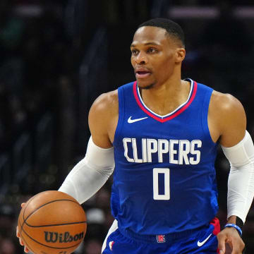 Dec 6, 2023; Los Angeles, California, USA; LA Clippers guard Russell Westbrook (0) dribbles the ball against the Sacramento Kings in the first half at Crypto.com Arena. 