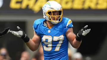 Sep 8, 2024; Inglewood, California, USA; Los Angeles Chargers linebacker Joey Bosa (97) celebrates after a tackle against the Las Vegas Raiders in the first half at SoFi Stadium. Mandatory Credit: Kirby Lee-Imagn Images