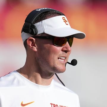 Nov 30, 2024; Los Angeles, California, USA; Southern California Trojans head coach Lincoln Riley reacts against the Notre Dame Fighting Irish in the second half at United Airlines Field at Los Angeles Memorial Coliseum. Mandatory Credit: Kirby Lee-Imagn Images
