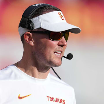 Nov 30, 2024; Los Angeles, California, USA; Southern California Trojans head coach Lincoln Riley reacts against the Notre Dame Fighting Irish in the second half at United Airlines Field at Los Angeles Memorial Coliseum. Mandatory Credit: Kirby Lee-Imagn Images