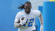 May 12, 2025; El Segundo, CA, USA; Los Angeles Chargers running back Najee Harris (22) carries the ball during offseason workouts at The Bolt. Mandatory Credit: Kirby Lee-Imagn Images
