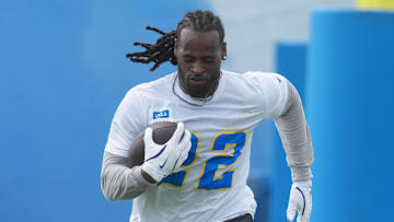 May 12, 2025; El Segundo, CA, USA; Los Angeles Chargers running back Najee Harris (22) carries the ball during offseason workouts at The Bolt. Mandatory Credit: Kirby Lee-Imagn Images