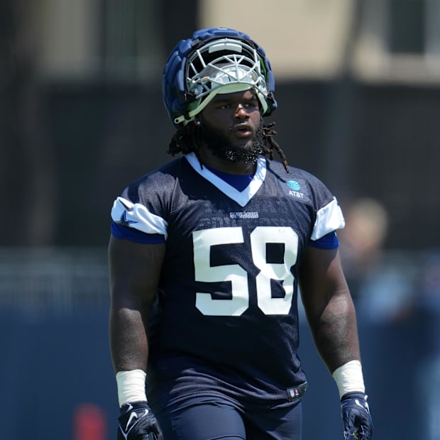 Dallas Cowboys defensive tackle Mazi Smith walks across the field during training camp in Oxnard, California.