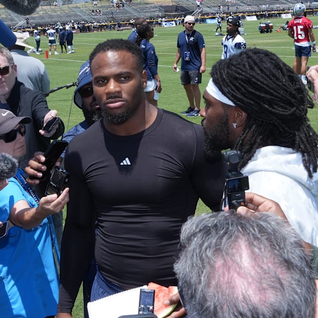 defensive end Micah Parsons (left) and cornerback Trevon Diggs