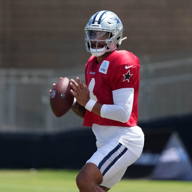Dallas Cowboys quarterback Dak Prescott throws the ball at training camp at the River Ridge Fields. 