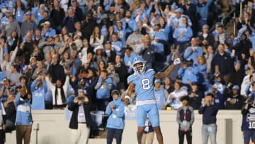 Oct 29, 2022; Chapel Hill, North Carolina, USA; North Carolina Tar Heels wide receiver Kobe Paysour (8) reacts after scoring a touchdown in the second quarter at Kenan Memorial Stadium. Mandatory Credit: Bob Donnan-USA TODAY Sports