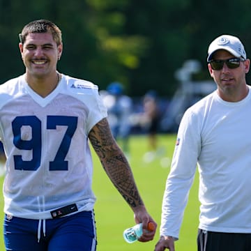 Indianapolis Colts defensive end Laiatu Latu (97) smiles while walking toward a member of the media Saturday, July 27, 2024, during the Indianapolis Colts’ training camp at Grand Park Sports Complex in Westfield.