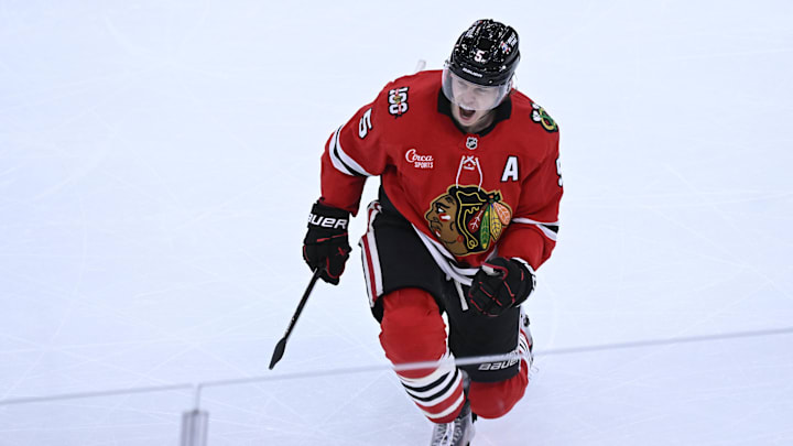Jan 7, 2026; Chicago, Illinois, USA;  Chicago Blackhawks defenseman Connor Murphy (5) celebrates after he scores a goal against the St. Louis Blues during the second period at the United Center. Mandatory Credit: Matt Marton-Imagn Images