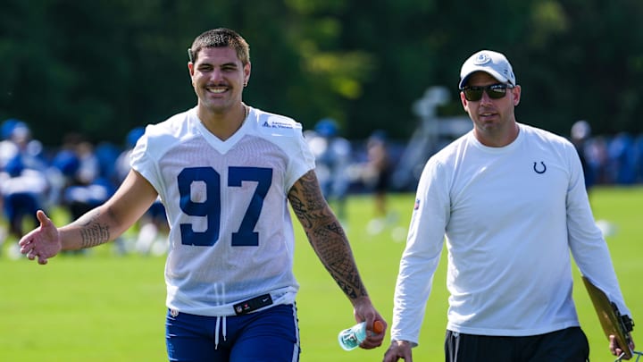 Indianapolis Colts defensive end Laiatu Latu (97) smiles while walking toward a member of the media Saturday, July 27, 2024, during the Indianapolis Colts’ training camp at Grand Park Sports Complex in Westfield.