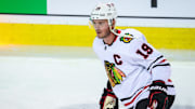 Apr 4, 2023; Calgary, Alberta, CAN; Chicago Blackhawks center Jonathan Toews (19) skates during the warmup period against the Calgary Flames at Scotiabank Saddledome. Mandatory Credit: Sergei Belski-Imagn Images