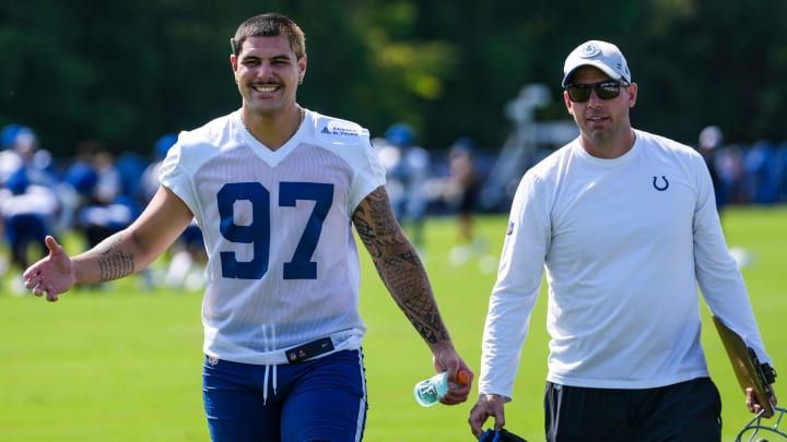 Indianapolis Colts defensive end Laiatu Latu (97) smiles while walking toward a member of the media Saturday, July 27, 2024, during the Indianapolis Colts’ training camp at Grand Park Sports Complex in Westfield.