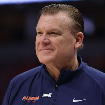 Mar 17, 2024; Minneapolis, MN, USA; Illinois Fighting Illini head coach Brad Underwood looks on in the first half against the Wisconsin Badgers at Target Center. Mandatory Credit: Matt Krohn-Imagn Images
