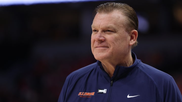 Illinois Fighting Illini head coach Brad Underwood looks on in the first half against the Wisconsin Badgers at Target Center.