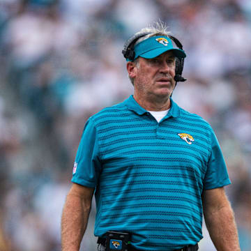 Sep 15, 2024; Jacksonville, Florida, USA; Jacksonville Jaguars head coach Doug Pederson talks with an official in the second quarter against the Cleveland Browns at EverBank Stadium. Mandatory Credit: Jeremy Reper-Imagn Images