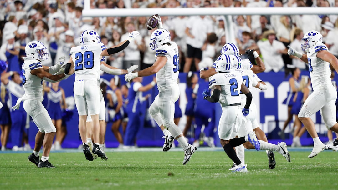 BYU's Tyler Batty celebrates an iterception against Kansas State
