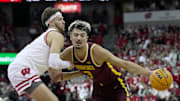 Minnesota forward Dawson Garcia (3) drives past Wisconsin forward Carter Gilmore (7) during the first half of their game Friday, January 10, 2025 at the Kohl Center in Madison, Wisconsin.