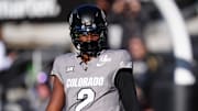 Nov 16, 2024; Boulder, Colorado, USA; Colorado Buffaloes quarterback Shedeur Sanders (2) looks on during the first quarter against the Utah Utes  at Folsom Field. Mandatory Credit: Ron Chenoy-Imagn Images