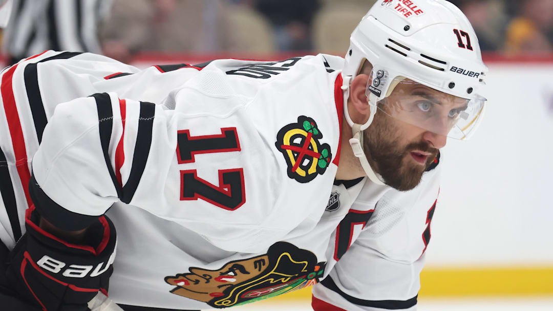 Apr 8, 2025; Pittsburgh, Pennsylvania, USA;  Chicago Blackhawks left wing Nick Foligno (17) at the face-off circle against the Pittsburgh Penguins during the third period at PPG Paints Arena. Mandatory Credit: Charles LeClaire-Imagn Images