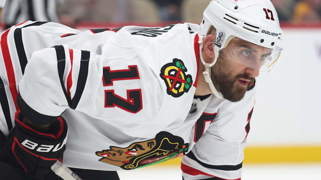 Apr 8, 2025; Pittsburgh, Pennsylvania, USA;  Chicago Blackhawks left wing Nick Foligno (17) at the face-off circle against the Pittsburgh Penguins during the third period at PPG Paints Arena. Mandatory Credit: Charles LeClaire-Imagn Images