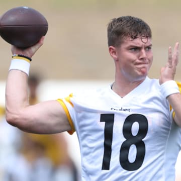Jul 24, 2025; Latrobe, PA, USA;  Pittsburgh Steelers quarterback Will Howard (18) participates in drills during training camp at Saint Vincent College. Mandatory Credit: Charles LeClaire-Imagn Images