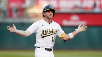 Jul 19, 2024; Oakland, California, USA; Oakland Athletics shortstop Max Schuemann (12) reacts after hitting a three-run home run against the Los Angeles Angels in the fourth inning at Oakland-Alameda County Coliseum. Mandatory Credit: Cary Edmondson-USA TODAY Sports