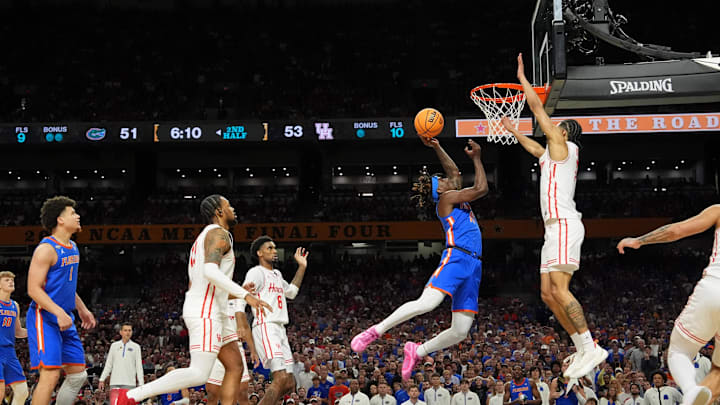 Apr 7, 2025; San Antonio, TX, USA; Florida Gators guard Denzel Aberdeen (11) shoots the ball against the Houston Cougars during the second half of the national championship game of the Final Four of the 2025 NCAA Tournament at the Alamodome. Mandatory Credit: Bob Donnan-Imagn Images