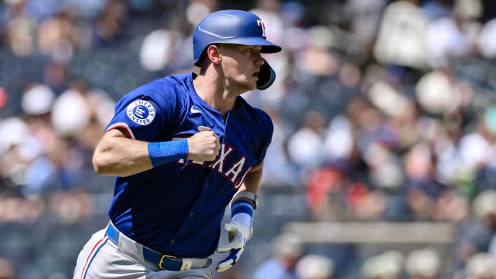 Aug 10, 2024; Bronx, New York, USA; Texas Rangers third baseman Josh Jung (6) hits a single against the New York Yankees during the third inning at Yankee Stadium. Mandatory Credit: John Jones-USA TODAY Sports