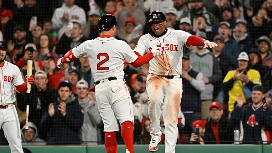 Apr 6, 2025; Boston, Massachusetts, USA; Boston Red Sox third baseman Alex Bregman (2) celebrates a three run home run against the St. Louis Cardinals with designated hitter Rafael Devers (11) during the third inning at Fenway Park. Mandatory Credit: Eric Canha-Imagn Images