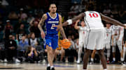 Nov 26, 2024; Las Vegas, Nevada, USA; Creighton Bluejays guard Pop Isaacs (2) dribbles toward San Diego Aztecs guard BJ Davis (10) during the second half at MGM Grand Garden Arena. Mandatory Credit: Jeffrey (Tyge) O'Donnell-Imagn Images