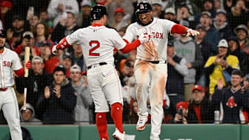 Apr 6, 2025; Boston, Massachusetts, USA; Boston Red Sox third baseman Alex Bregman (2) celebrates a three run home run against the St. Louis Cardinals with designated hitter Rafael Devers (11) during the third inning at Fenway Park. Mandatory Credit: Eric Canha-Imagn Images
