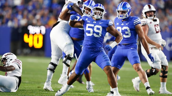 Logan Lutui celebrates a defensive stop against Southern Illinois.