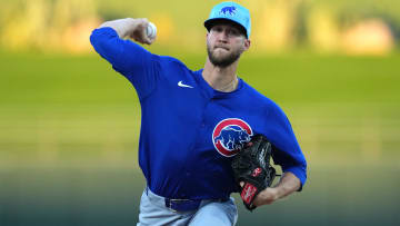 Mar 5, 2024; Surprise, Arizona, USA; Chicago Cubs starting pitcher Caleb Kilian (45) pitches against the Kansas City Royals during the first inning at Surprise Stadium.