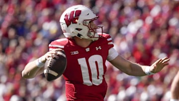 Sep 7, 2024; Madison, Wisconsin, USA;  Wisconsin Badgers quarterback Tyler Van Dyke (10) throws a pass during the first quarter against the South Dakota Coyotes at Camp Randall Stadium. Mandatory Credit: Jeff Hanisch-Imagn Images