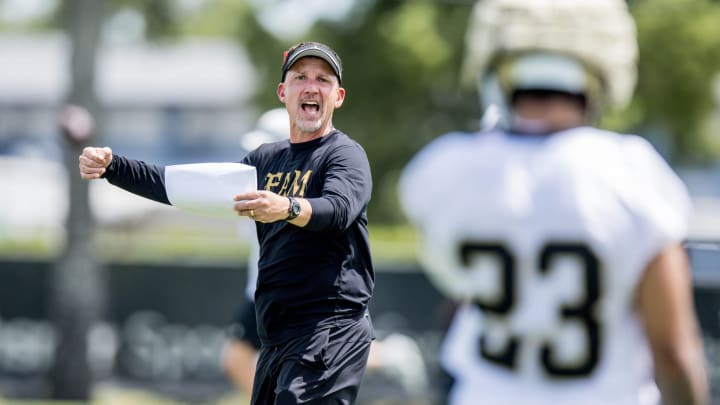 Jun 13, 2023; New Orleans, LA, USA;  New Orleans Saints head coach Dennis Allen gives instructions to cornerback Marshon Lattimore (23) during minicamp at the Ochsner Sports Performance Center. Mandatory Credit: Stephen Lew-USA TODAY Sports